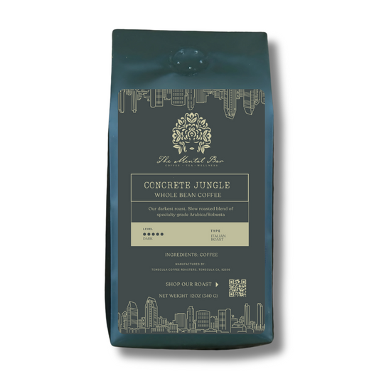 Concrete Jungle dark Italian roast coffee beans in premium packaging.